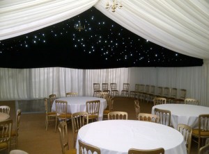 Starlight lining with round tables and Gilt banqueting chairs